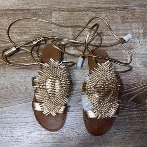 NWT “David Isaac lace up around the leg rose gold sandles